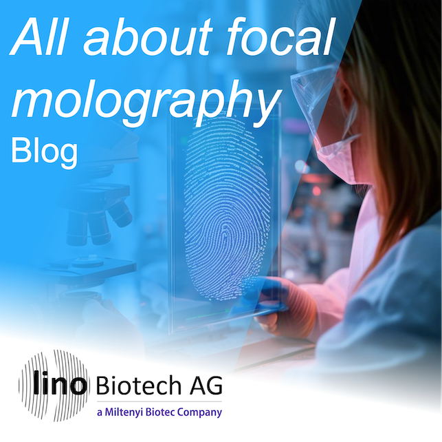 Blog cover for the article introducing focal molography: a researcher in a mask and goggles working at a transparent panel with a swirled line pattern